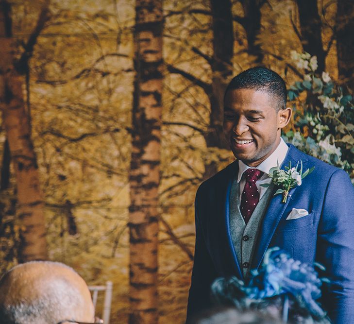 Groom at the Altar in Navy Bespoke Club Suit | Stylish London Wedding Planned by Revelry Events | Story + Colour Photography