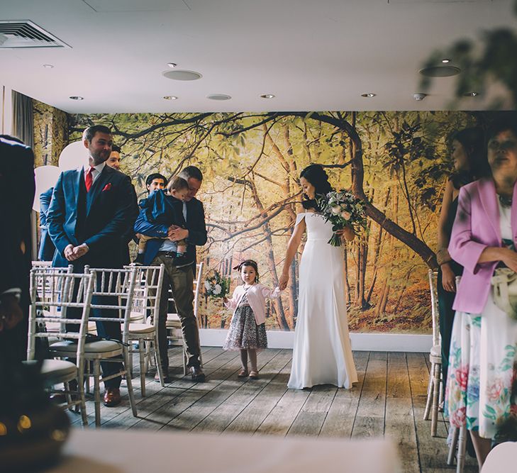 Bridal Entrance in Poppy Reformation Wedding Gown with Cold Shoulder Design | Stylish London Wedding Planned by Revelry Events | Story + Colour Photography