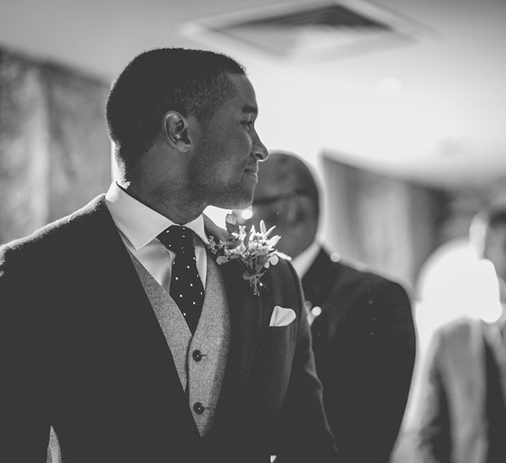 Groom at the Altar in Navy Bespoke Club Suit | Stylish London Wedding Planned by Revelry Events | Story + Colour Photography