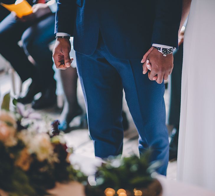 Wedding Ceremony | Bride in Reformation Poppy Gown | Groom in Navy Bespoke Club Suit | Stylish London Wedding Planned by Revelry Events | Story + Colour Photography