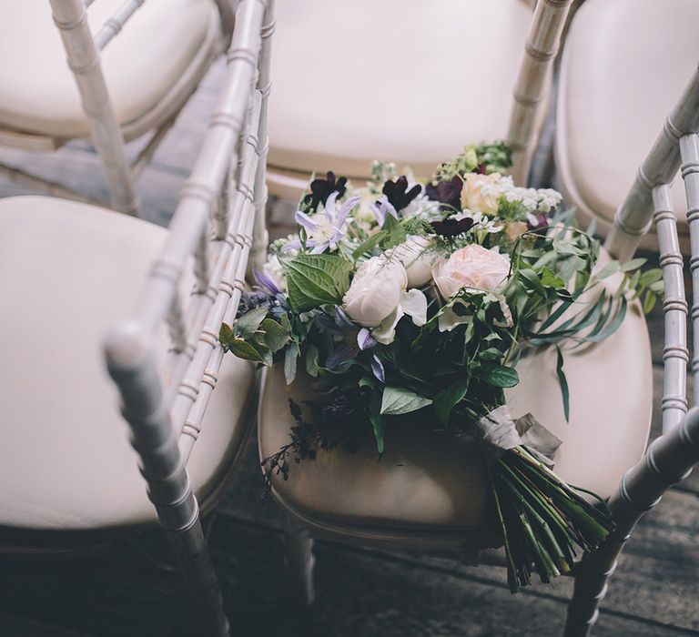 Aisle Floral Chair Decor | Stylish London Wedding Planned by Revelry Events | Story + Colour Photography