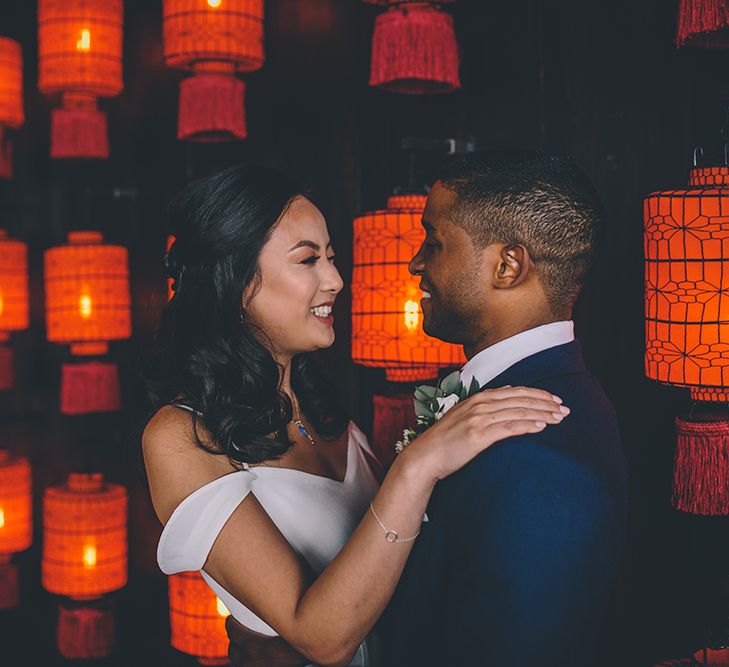 Bride in Reformation Poppy Gown | Groom in Navy Bespoke Club Suit | Stylish London Wedding Planned by Revelry Events | Story + Colour Photography