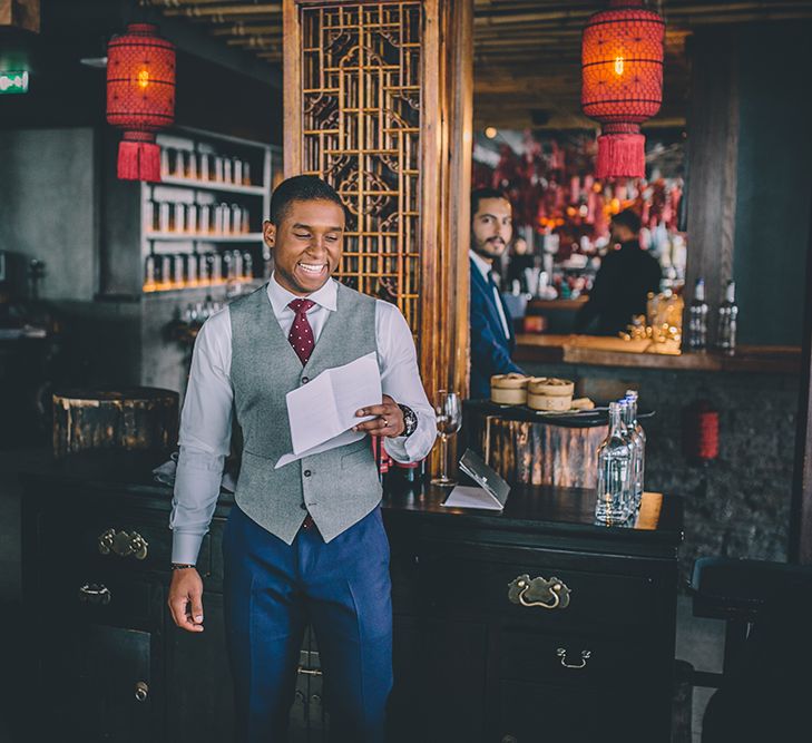 Groom in Navy Bespoke Club Suit | Stylish London Wedding Planned by Revelry Events | Story + Colour Photography