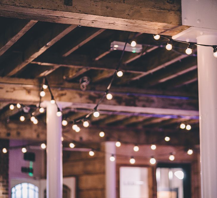 Festoon Lights Wedding Decor | Stylish London Wedding Planned by Revelry Events | Story + Colour Photography