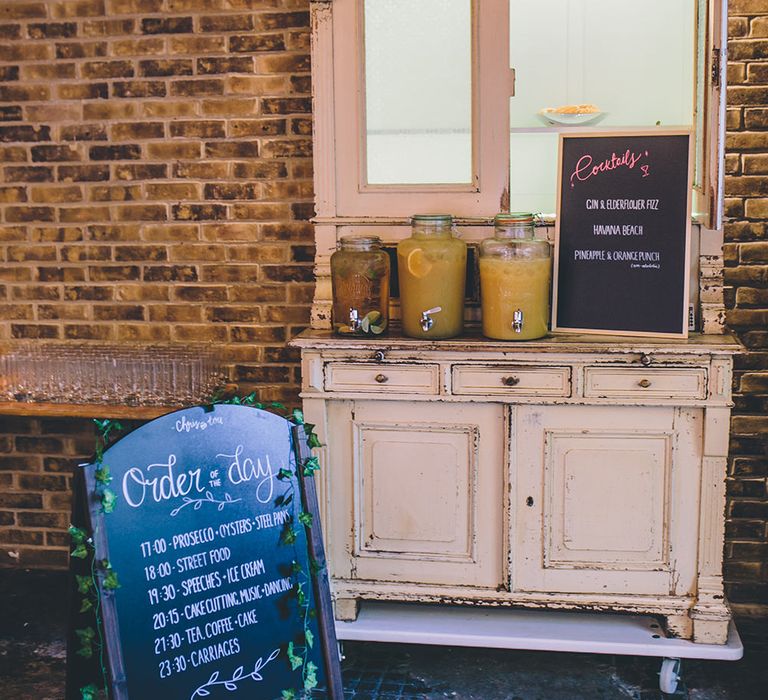 Vintage Dress Drinks Dispenser Station | Stylish London Wedding Planned by Revelry Events | Story + Colour Photography