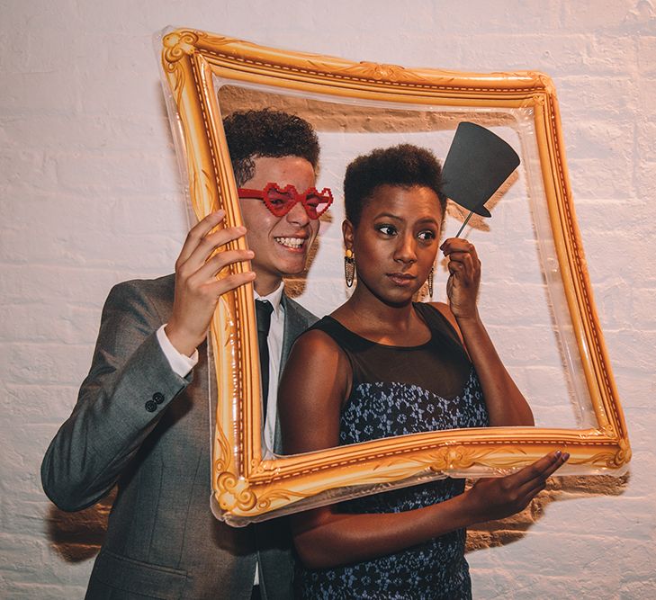 Photo Booth Props | Stylish London Wedding Planned by Revelry Events | Story + Colour Photography