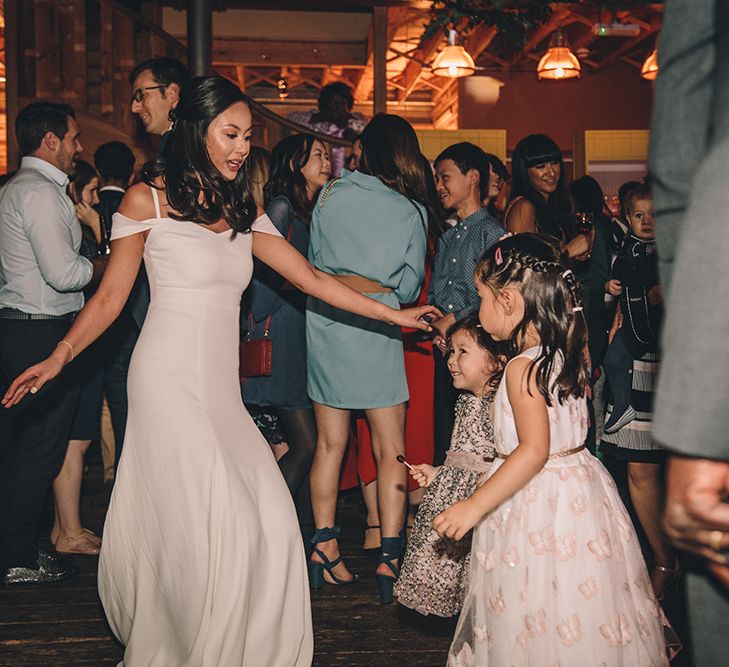 Bride in Reformation Poppy Gown | Stylish London Wedding Planned by Revelry Events | Story + Colour Photography