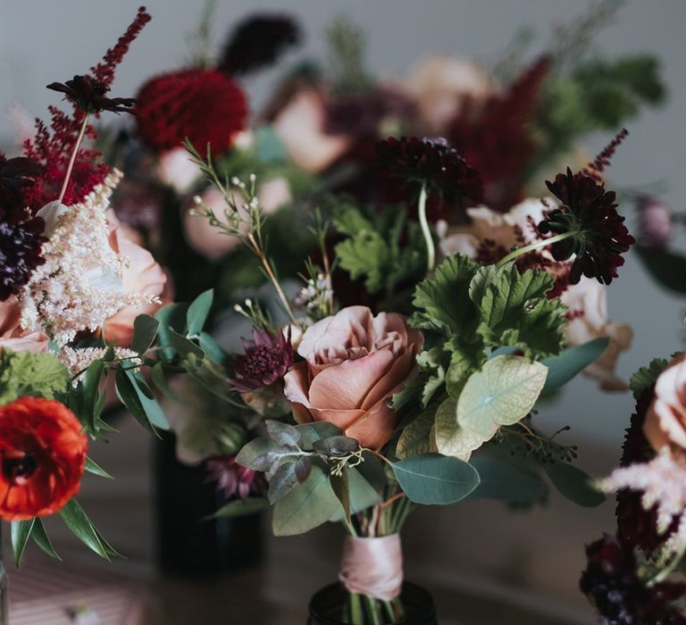 Dusky Pink & Red Flower Stems in Miniature Bottles | Intimate Ceremony at Stoke Newington Town Hall | Miss Gen Photography