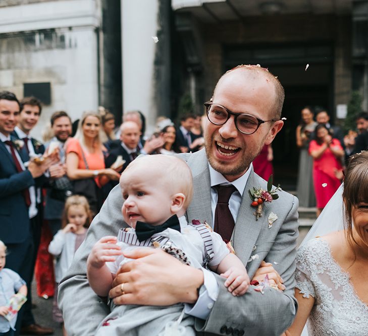 Confetti Moment | Bride in Cymbeline Wedding Dress | Groom in Bailey Nelson Suit | Intimate Ceremony at Stoke Newington Town Hall | Miss Gen Photography