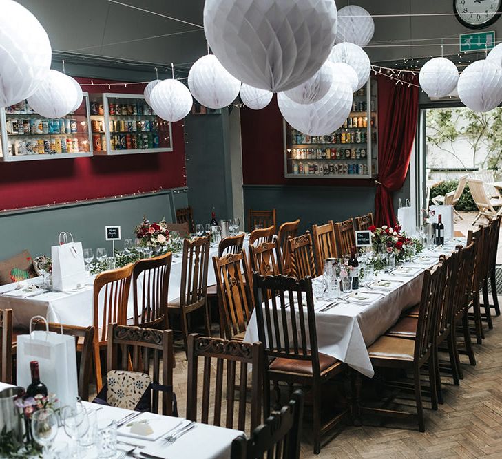 Hanging White Honeycomb Balls | Laid Back Pub Wedding at The Londesborough | Miss Gen Photography