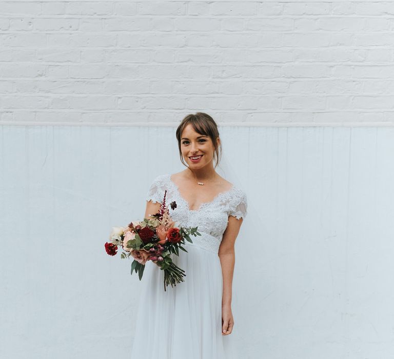 Bride in Cymbeline Wedding Dress | Red Dahlia Bouquet | Laid Back Pub Wedding at The Londesborough | Miss Gen Photography