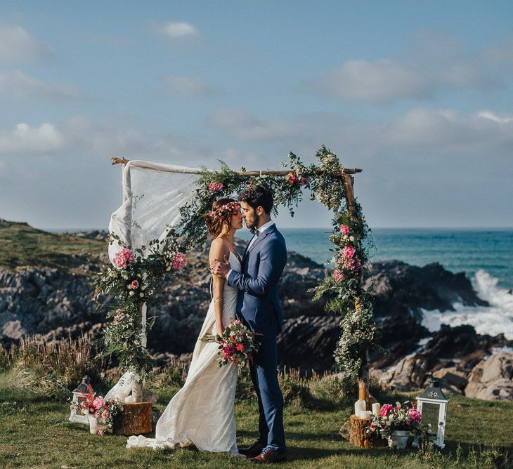 Engagement Shoot On The Cliffside In Asturias With Incredible Floral Ceremony Arch