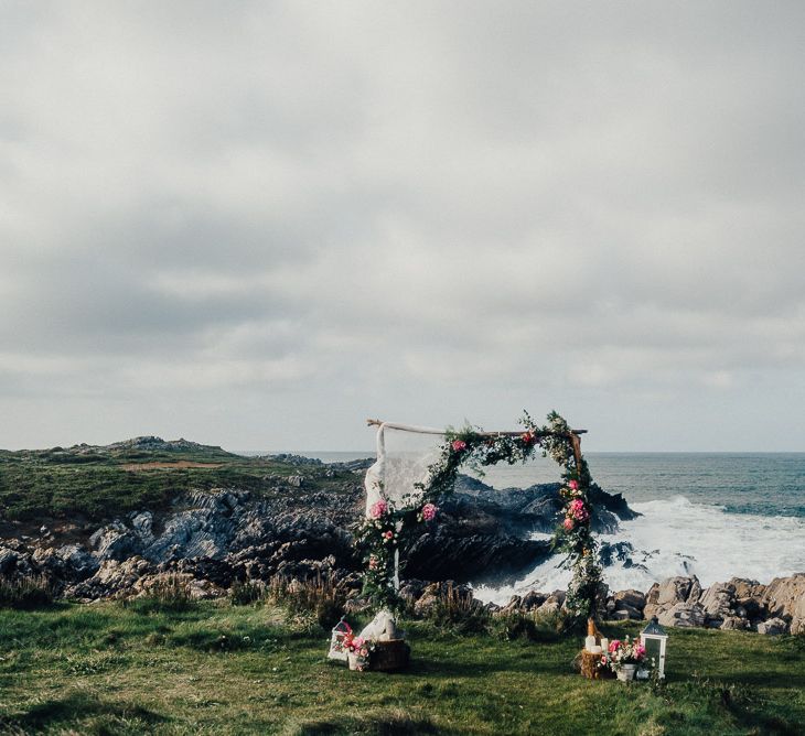 Engagement Shoot On The Cliffside In Asturias With Incredible Floral Ceremony Arch