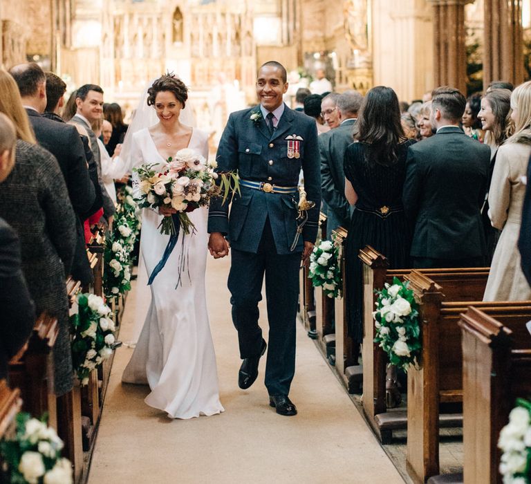 Wedding Ceremony with Bride in Charlotte Simpson Wedding Dress & Groom in Military Uniform