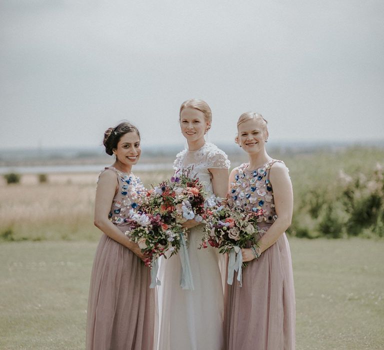 Bride in Alice Temperley Gown | Bridesmaids in Beaded Blush ASOS Dresses | Lola Rose Photography