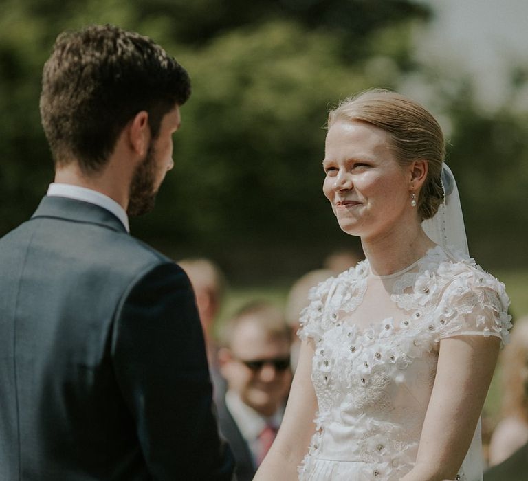 Outdoor Wedding Ceremony at Elmley Nature Reserve | Bride in Alice Temperley Gown | Groom in Edit Suits Co | Lola Rose Photography