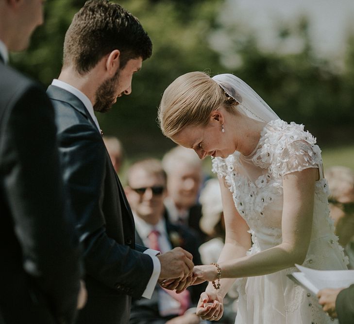 Outdoor Wedding Ceremony at Elmley Nature Reserve | Bride in Alice Temperley Gown | Groom in Edit Suits Co | Lola Rose Photography