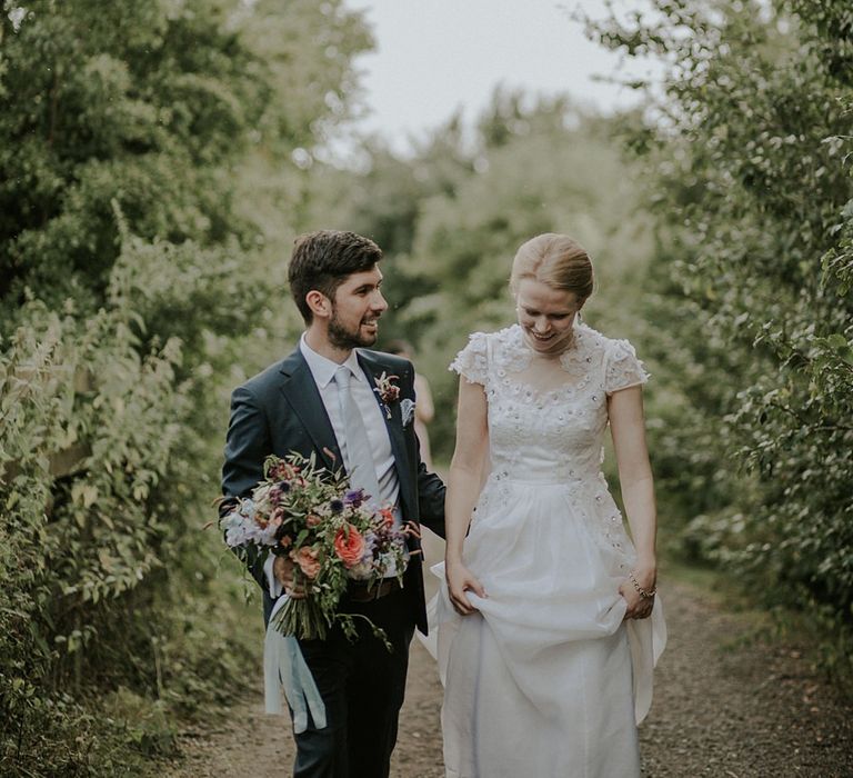 Bride in Alice Temperley Gown | Groom in Edit Suits Co | Lola Rose Photography