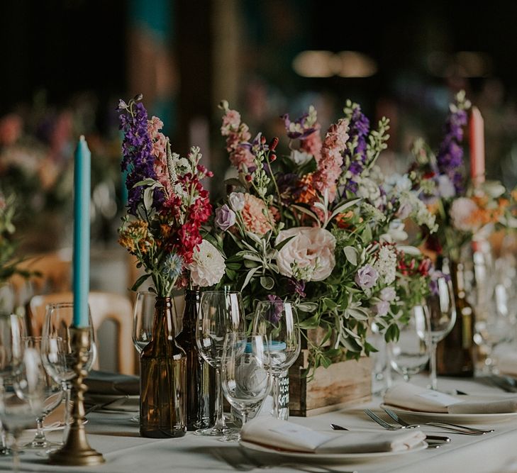 Colourful Wild Flower Crate Centrepiece by Joanne Truby | Elmley Nature Reserve Wedding | Lola Rose Photography