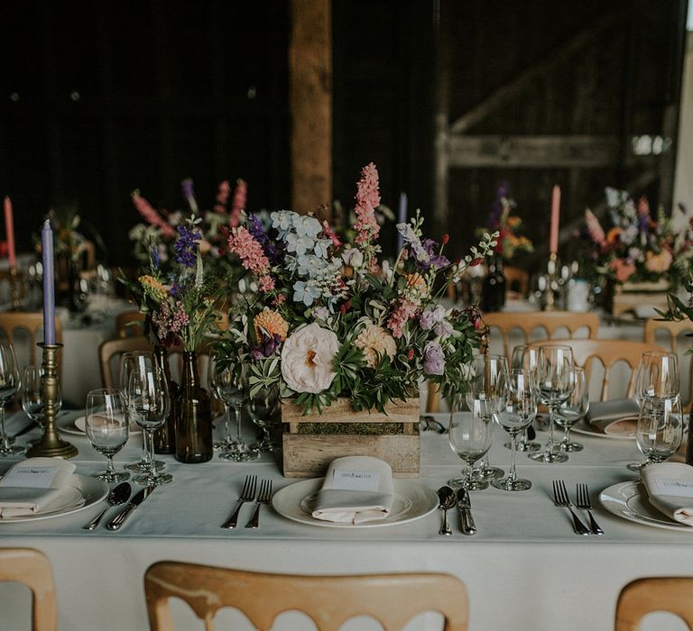 Colourful Wild Flower Crate Centrepiece by Joanne Truby | Elmley Nature Reserve Wedding | Lola Rose Photography