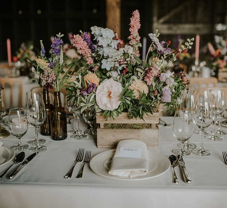 Colourful Wild Flower Crate Centrepiece by Joanne Truby | Elmley Nature Reserve Wedding | Lola Rose Photography