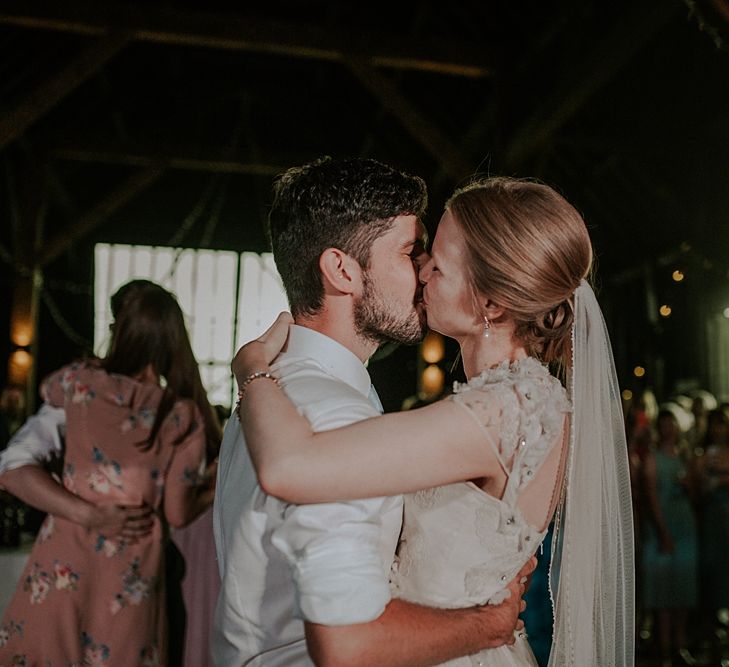 Bride in Alice Temperley Gown | Groom in Edit Suits Co | Lola Rose Photography