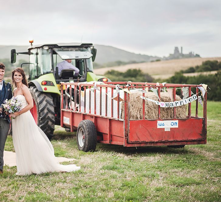 Wedding Transport On Tractor // Rustic Tipi Wedding With Handmade Details At Purbeck Valley Farmhouse With Coastal Tents Tipi And Images From Darima Frampton Photography