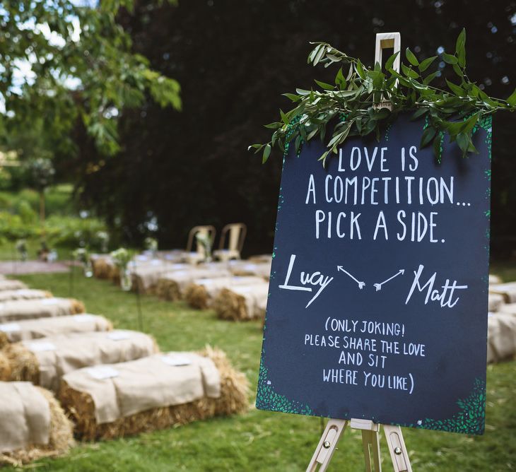 Outdoor Wedding Ceremony with Seating Sign