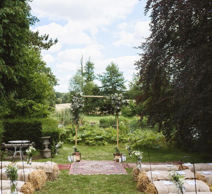 Outdoor Rustic Aisle & Altar with Hay Bales & Rugs