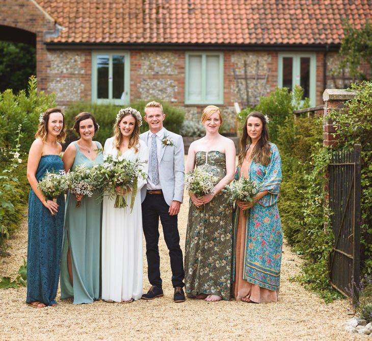 Bridesmaids in Mismatch High Street Dresses