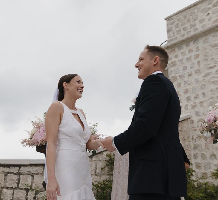 Outdoor Wedding Ceremony | Bride in Temperley Gown | Groom in David Copperfield Suit | Romantic Pink & White French Riviera Wedding at Chateau Saint Jeannet | Sebastien Boudot Photography | Shoot Me Now Films