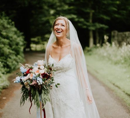 Bride in Pronovias Gown & Autumnal Bouquet