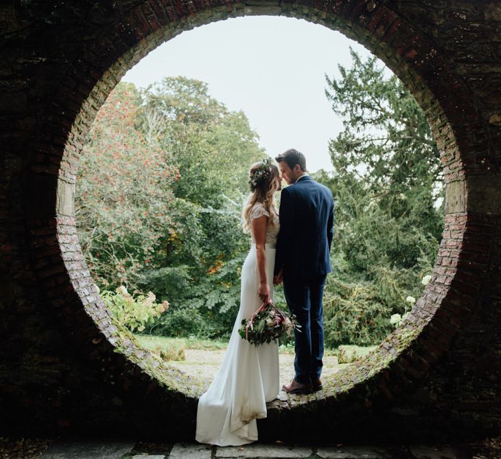 Bride in Bespoke Suzanne Neville Scarlett Bridal Gown | Groom in Herbie Frogg Suit & Liberty Print Mrs Bow Tie | The Lou's Photography