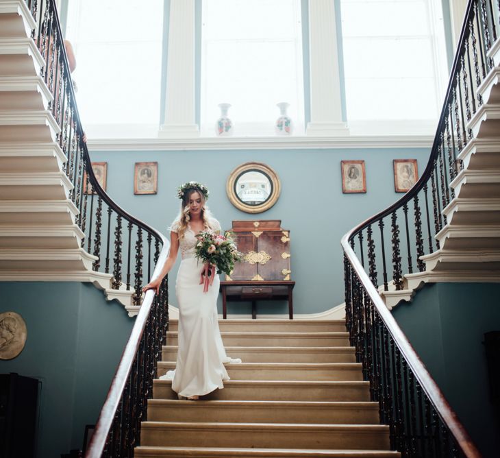 Bride in Bespoke Suzanne Neville Scarlett Bridal Gown | Protea Bouquet & Flower Crown | The Lou's Photography