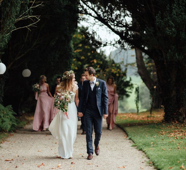 Bride in Bespoke Suzanne Neville Scarlett Bridal Gown | Groom in Herbie Frogg Suit & Liberty Print Mrs Bow Tie | The Lou's Photography