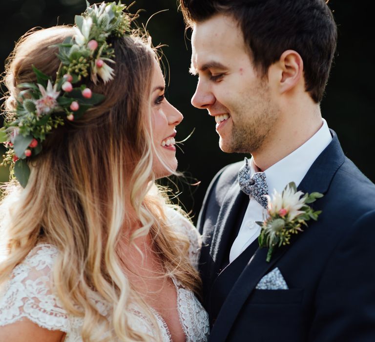 Bride in Bespoke Suzanne Neville Scarlett Bridal Gown | Groom in Herbie Frogg Suit & Liberty Print Mrs Bow Tie | The Lou's Photography