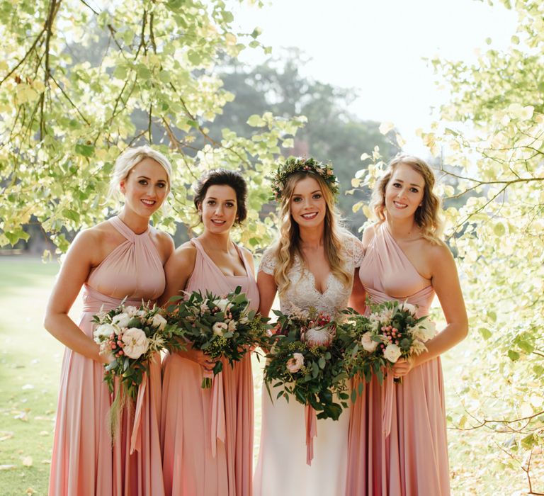 Bride in Bespoke Suzanne Neville Scarlett Bridal Gown | Bridesmaids in Pink Twobirds Dresses | The Lou's Photography