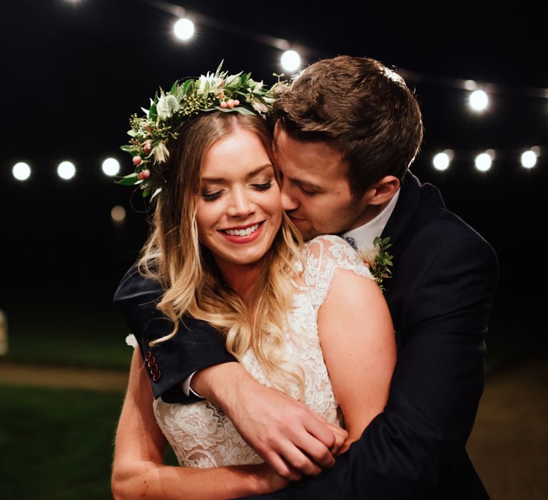 Festoon Lights | Bride in Bespoke Suzanne Neville Scarlett Bridal Gown | Groom in Herbie Frogg Suit & Liberty Print Mrs Bow Tie | The Lou's Photography