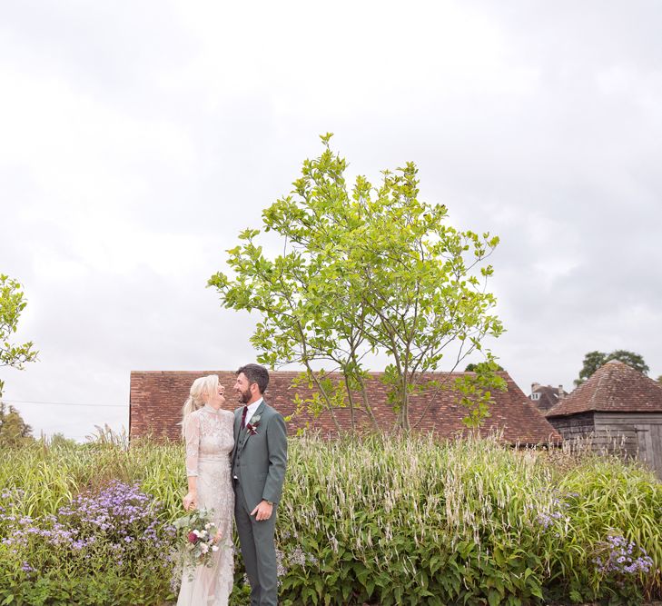 Bride in Bespoke Grey Lace Hermione De Paula Gown | Groom in Mark Powell Suit | Cotton Candy Photography