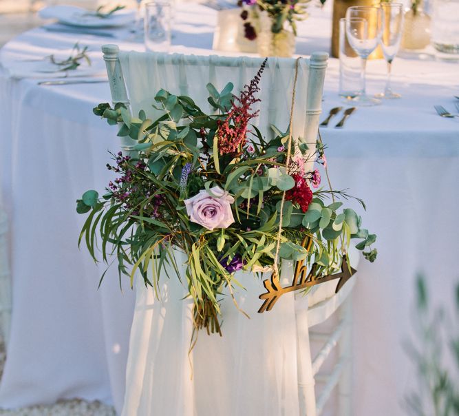 Floral Chair Back Decor | Jewel Coloured Spanish Wedding Planned & Styled by Rachel Rose Weddings | Anna Gazda Photography