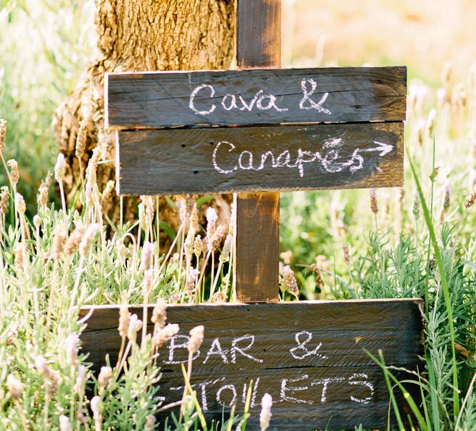 Wooden Direction Sign Post | Jewel Coloured Spanish Wedding Planned & Styled by Rachel Rose Weddings | Anna Gazda Photography