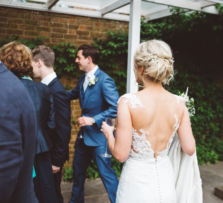 Elegant Pastel Wedding Northbrook Park Rose & Peony Floral Arrangements & Bride In Illusion Lace Dress By Pronovias & Images From Hollie Carlin Photography