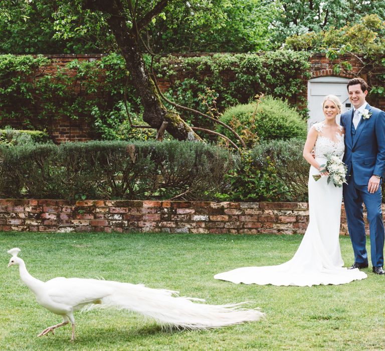 Elegant Pastel Wedding Northbrook Park Rose & Peony Floral Arrangements & Bride In Illusion Lace Dress By Pronovias & Images From Hollie Carlin Photography