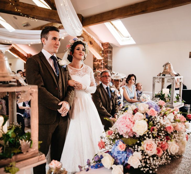 Wedding Ceremony | Bride in Bespoke Something Blue Tea Length Wedding Dress | Pastel Flower Crown & Bouquet | Ally M Photography