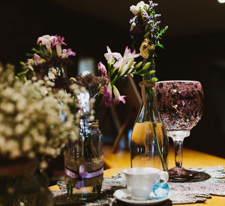 Flower Stems in Bottles Wedding Decor | Ally M Photography