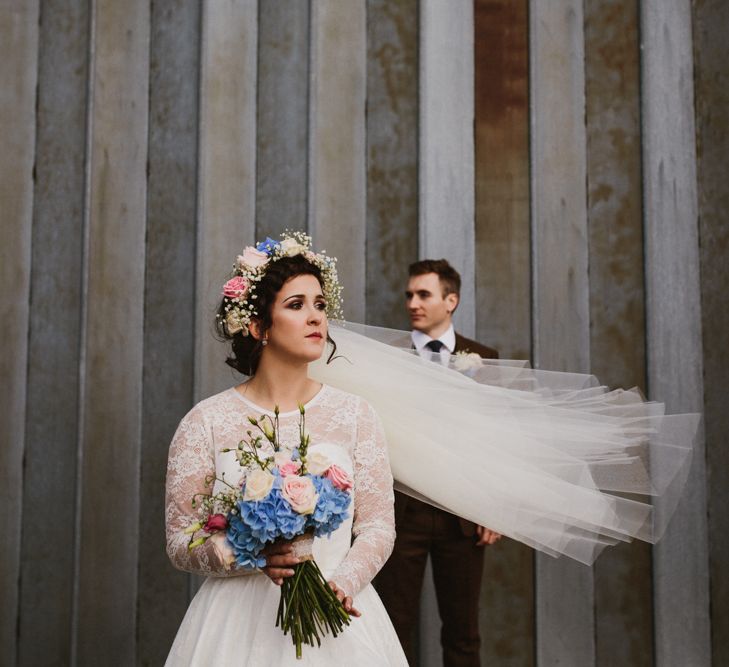 Bride in Bespoke Something Blue Tea Length Wedding Dress | Pastel Flower Crown & Bouquet | Ally M Photography