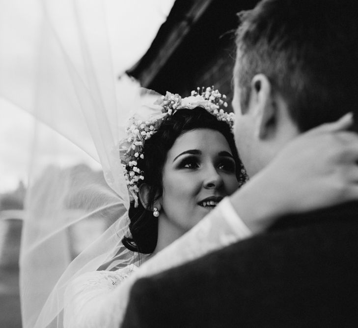 Bride in Bespoke Something Blue Tea Length Wedding Dress | Pastel Flower Crown & Bouquet | Groom in Brown Tweet Suit | Ally M Photography