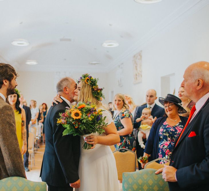 Wedding Ceremony | Bride in ASOS Wedding Dress | Groom in Tweed Suit | Bright DIY Back Garden Wedding | Lisa Webb Photography