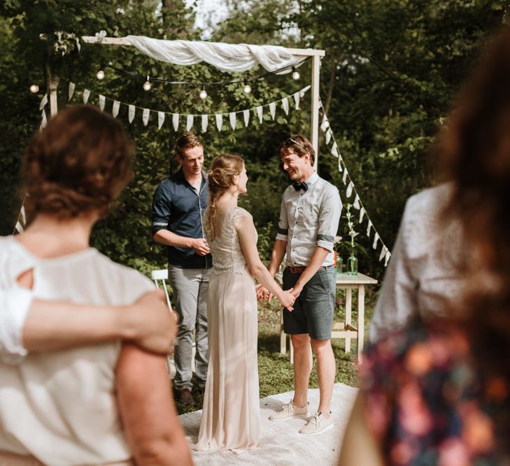 Outdoor Wedding Ceremony With Bunting & Festoon Lights