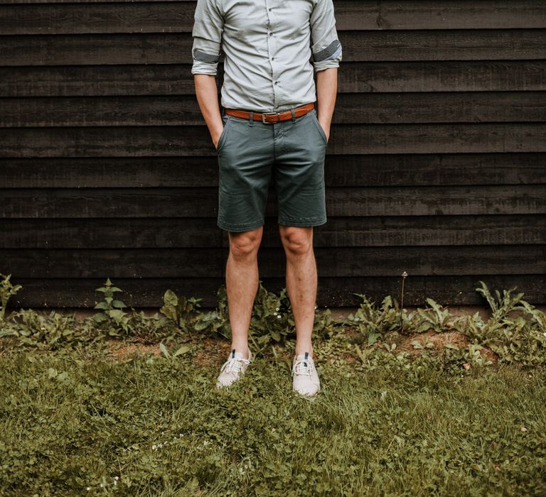 Groom In Shorts & Shirt For Relaxed Festival Wedding